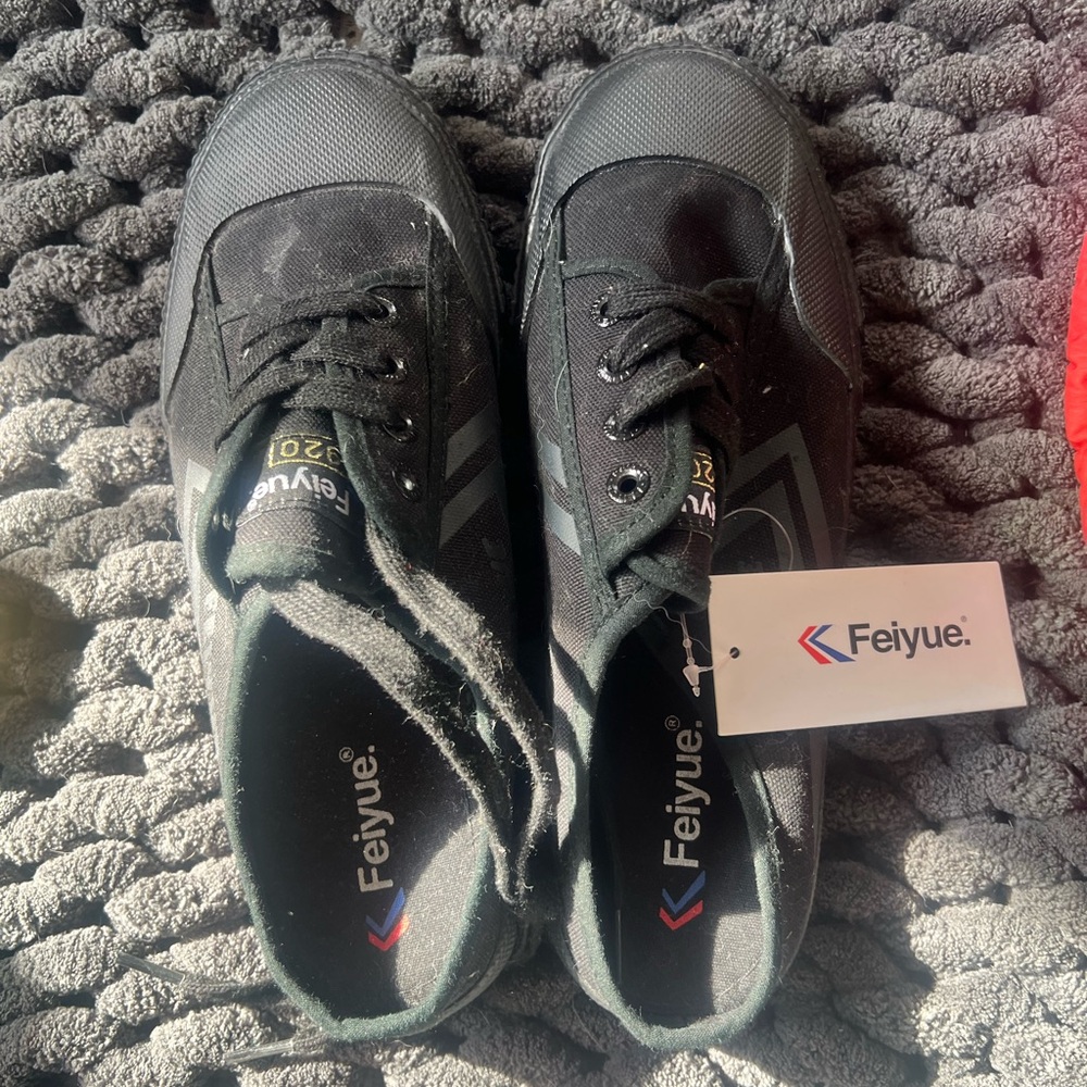 New shoes. Black slip on shoes. Feiyue